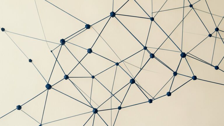 A network of geometric nodes with thin connecting lines forming a constellation.